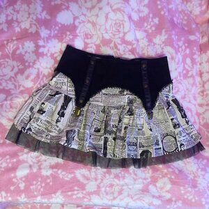 lip service step in time vintage newspaper clipping tulle mini garter skirt